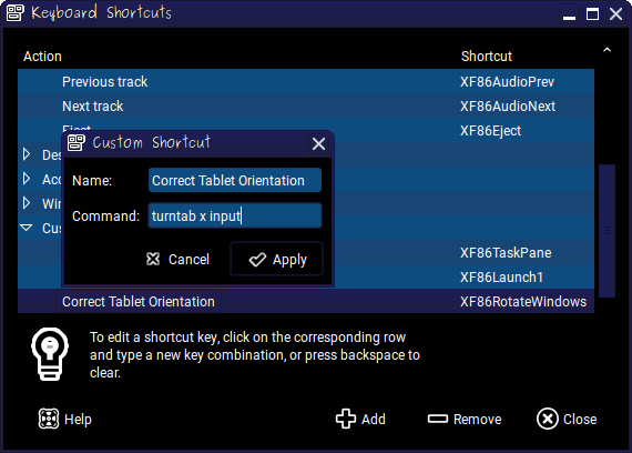 Two rather chaotic dialogue boxes, assigning the command 'turntab x input' to a button which is identified as 'XF86RotateWindows'.